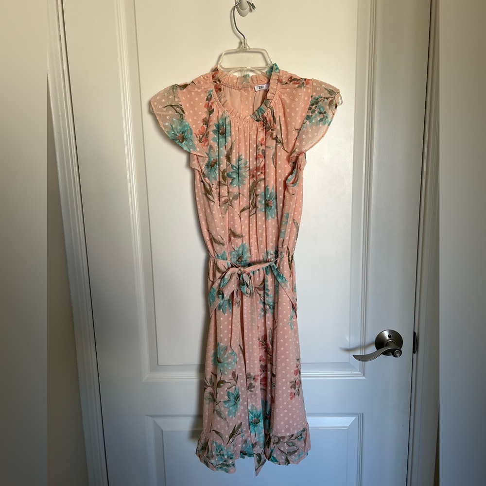 Wore this once as a wedding guest dress! Super comfy and lightweight.